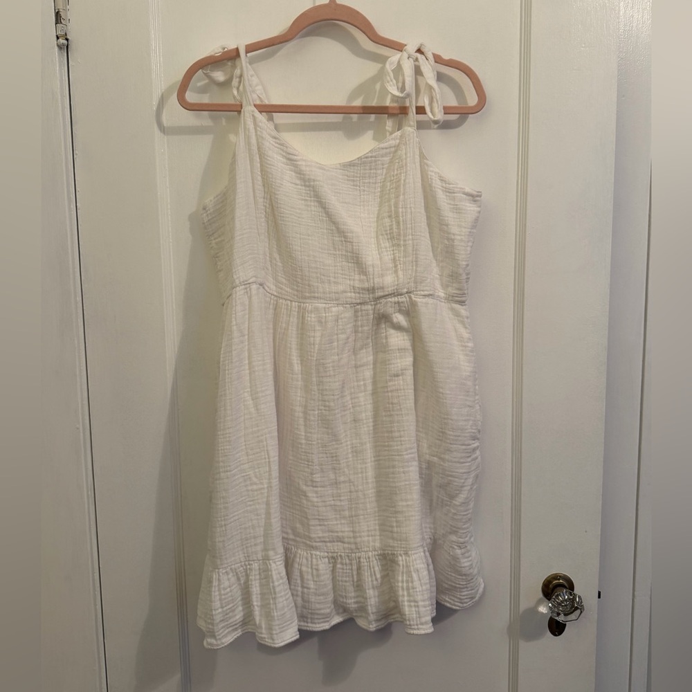 White Sleeveless Dress with Ruffle Hem